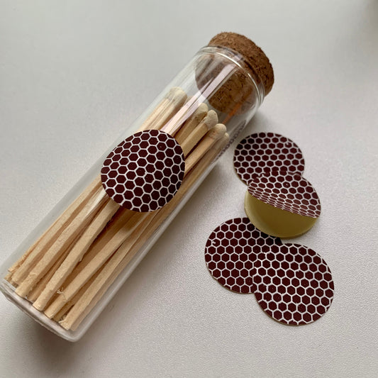 Self-adhesive striker paper makes it easy to use your safety matches!